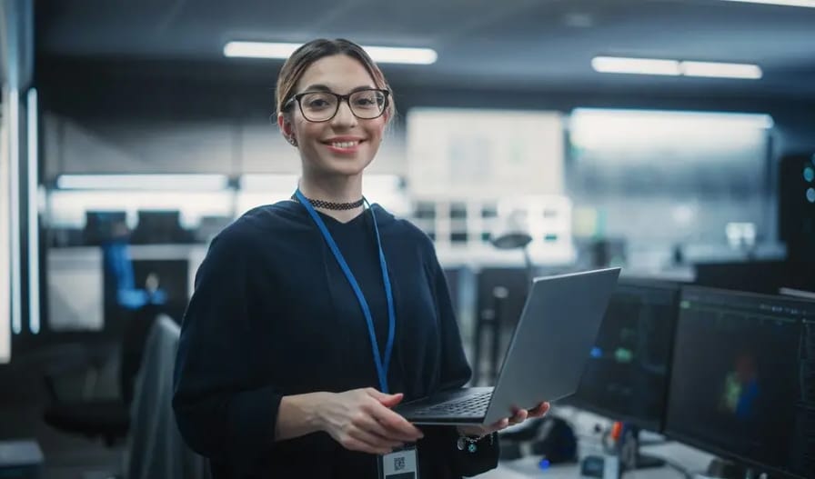 business woman wearing eyeglasses with holding her laptop 1